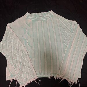 Oversized green knitted distressed sweater